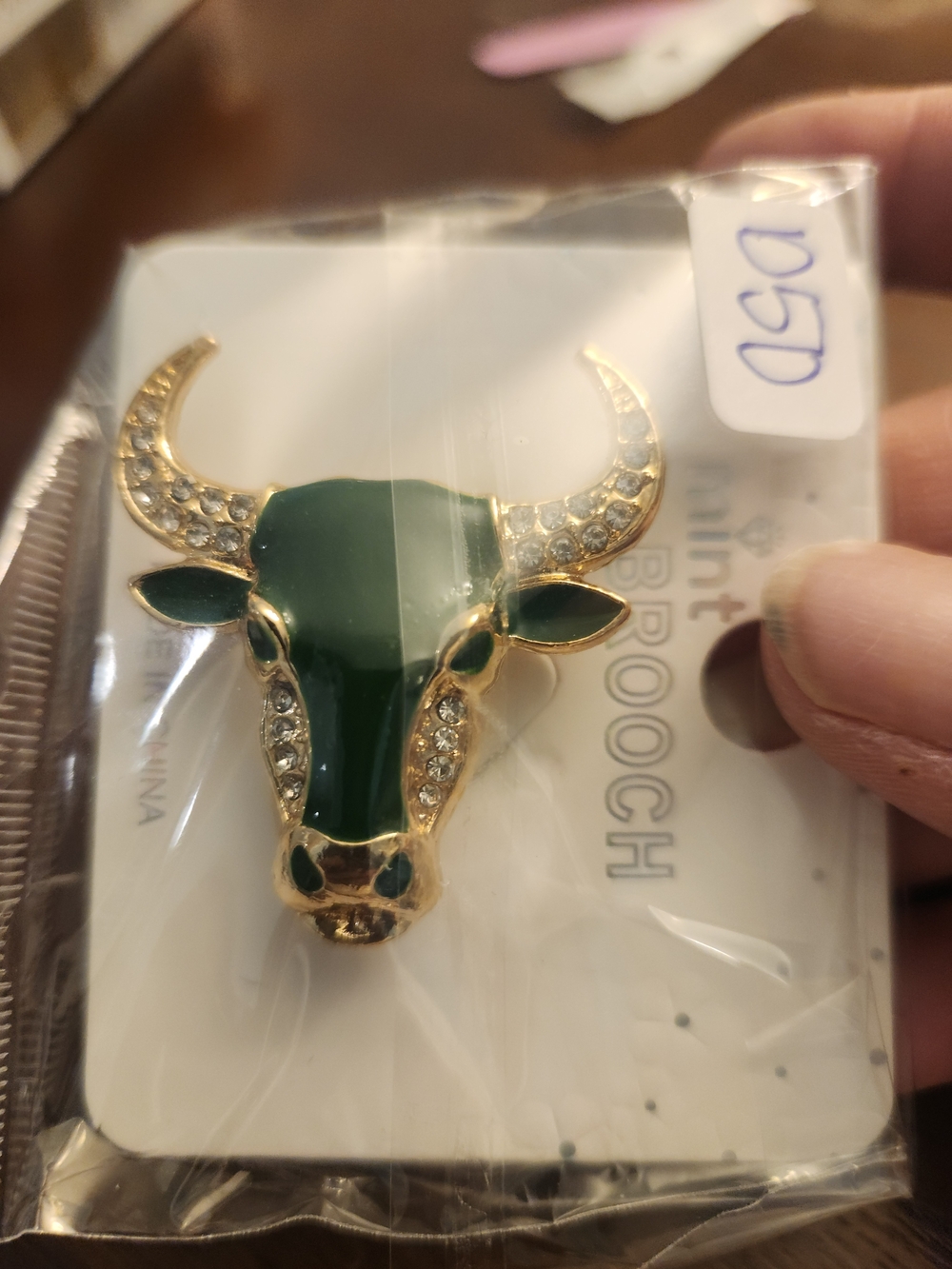 Gold-Tone Green Bull Head Brooch with Crystal Accents